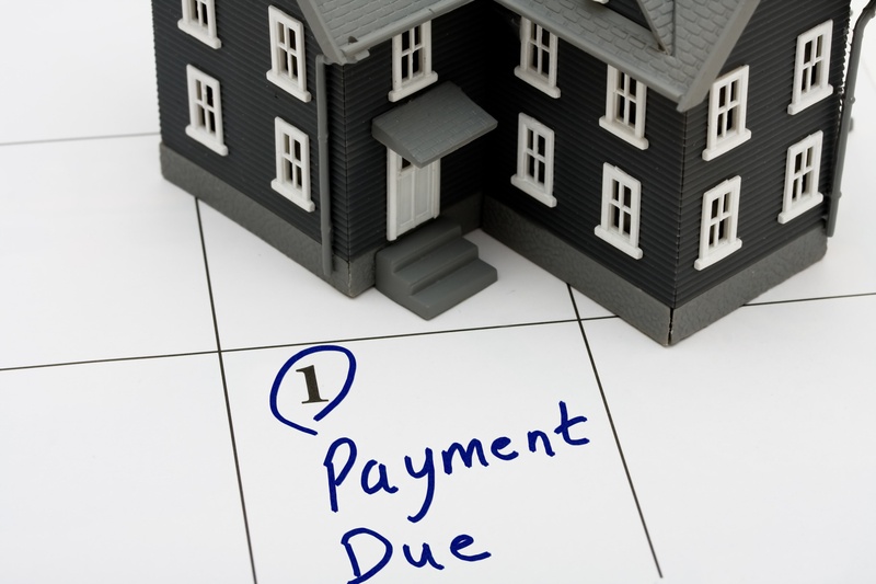 What Happens if a Mortgage Payment is Late? - Source Mortgage - Mortgage Experts Alberta - Featured Image