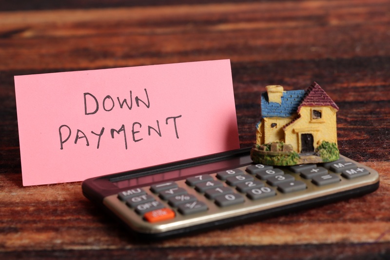 5 Tips and Tricks to Save for a Downpayment - Source Mortgage - Featured Image